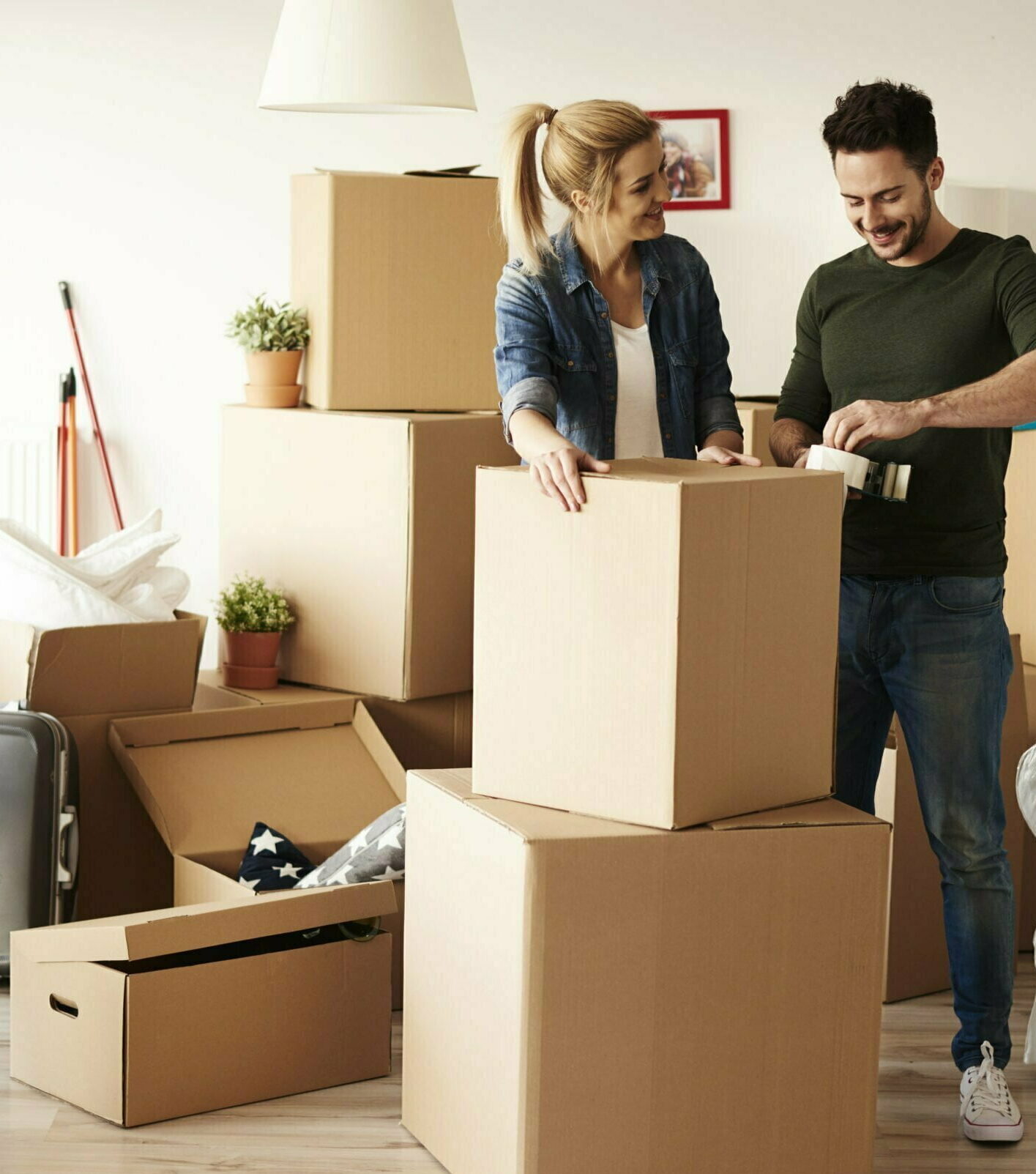 Professional packers and movers packing boxes
